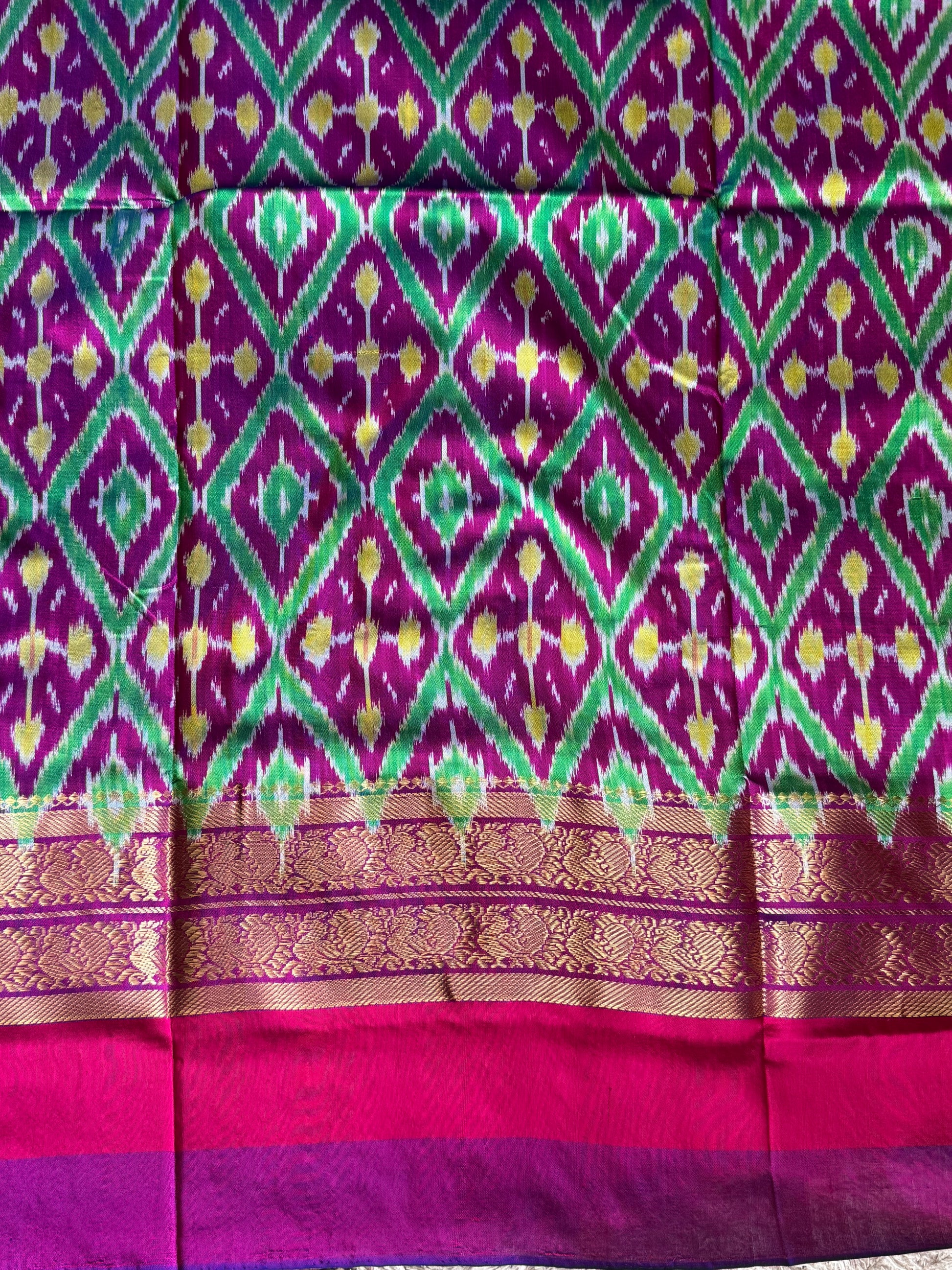 Ikkat Pattu Saree Turmeric Yellow colored complemented with a Kanchi border. - Sampradaya Designer Studio