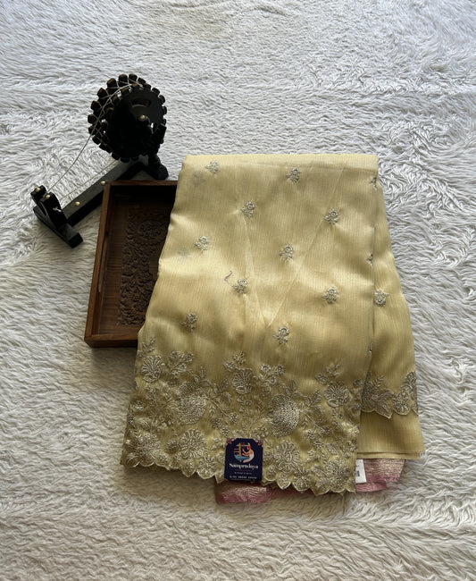 Tissue Organza Saree Cream Colored Elegantly Paired with a Embroidery Border. - Sampradaya Designer Studio