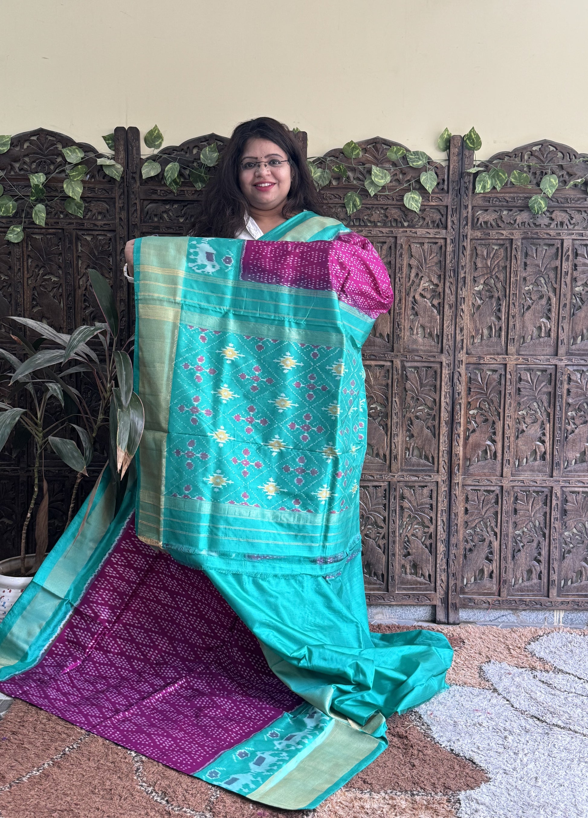 Ikkat Pattu Saree Hot Pink colored complemented with a Zari border. - Sampradaya Designer Studio