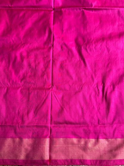 Ikkat Pattu Saree Turquoise colored complemented with a Zari border. - Sampradaya Designer Studio