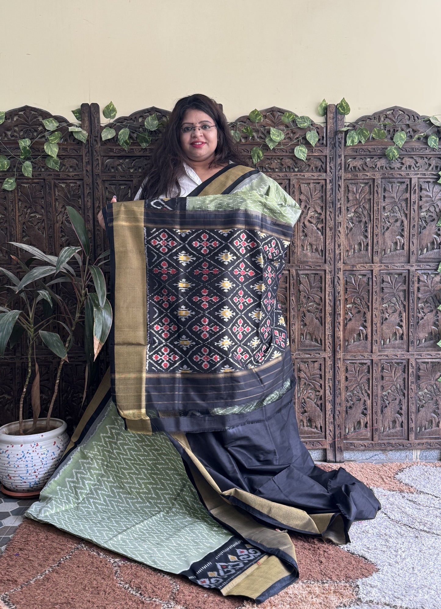 Ikkat Pattu Saree Olive Green colored complemented with a Ikkat Zari border. - Sampradaya Designer Studio