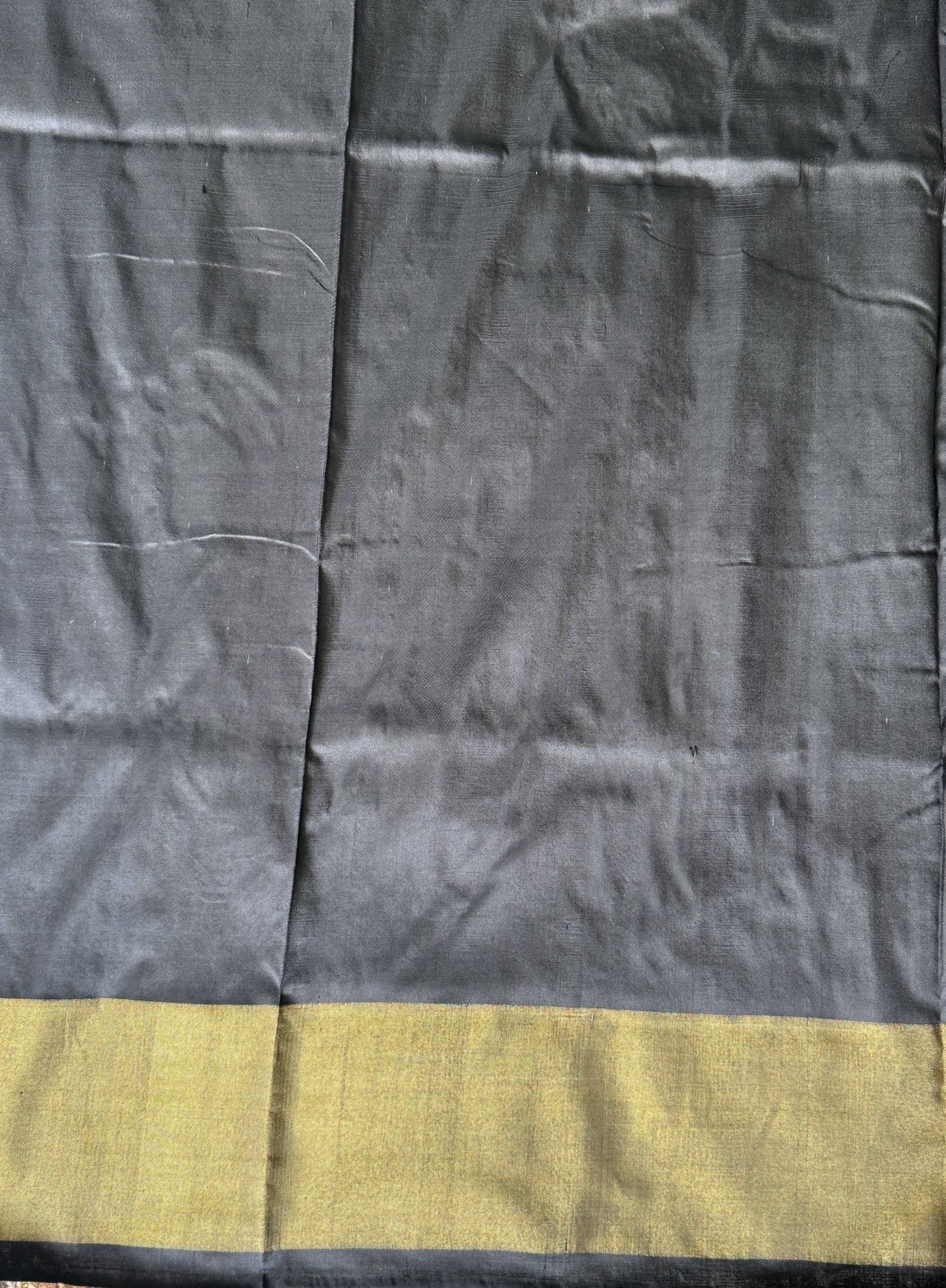 Ikkat Pattu Saree Olive Green colored complemented with a Ikkat Zari border. - Sampradaya Designer Studio