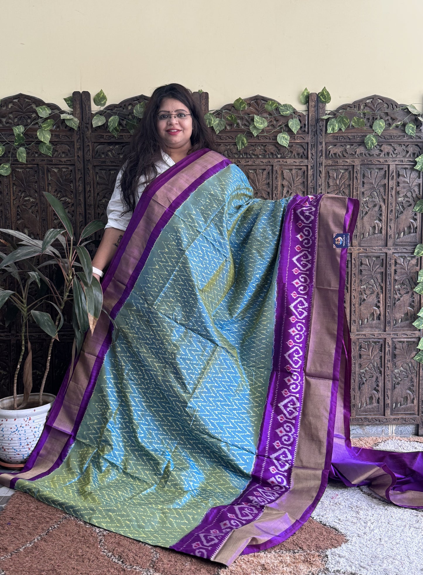 Ikkat Pattu Saree Blue colored complemented with a Ikkat Zari border. - Sampradaya Designer Studio