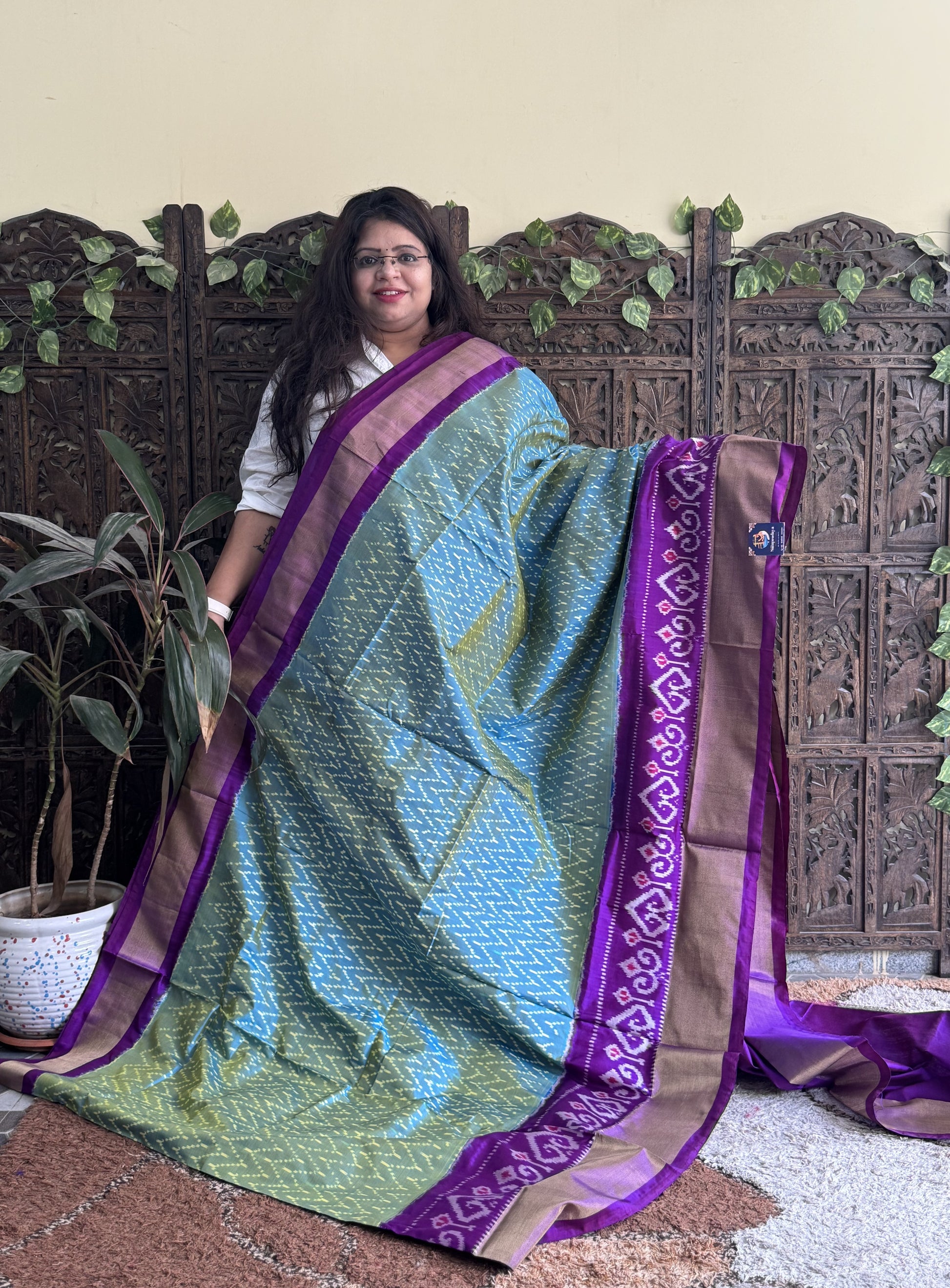 Ikkat Pattu Saree Blue colored complemented with a Ikkat Zari border. - Sampradaya Designer Studio