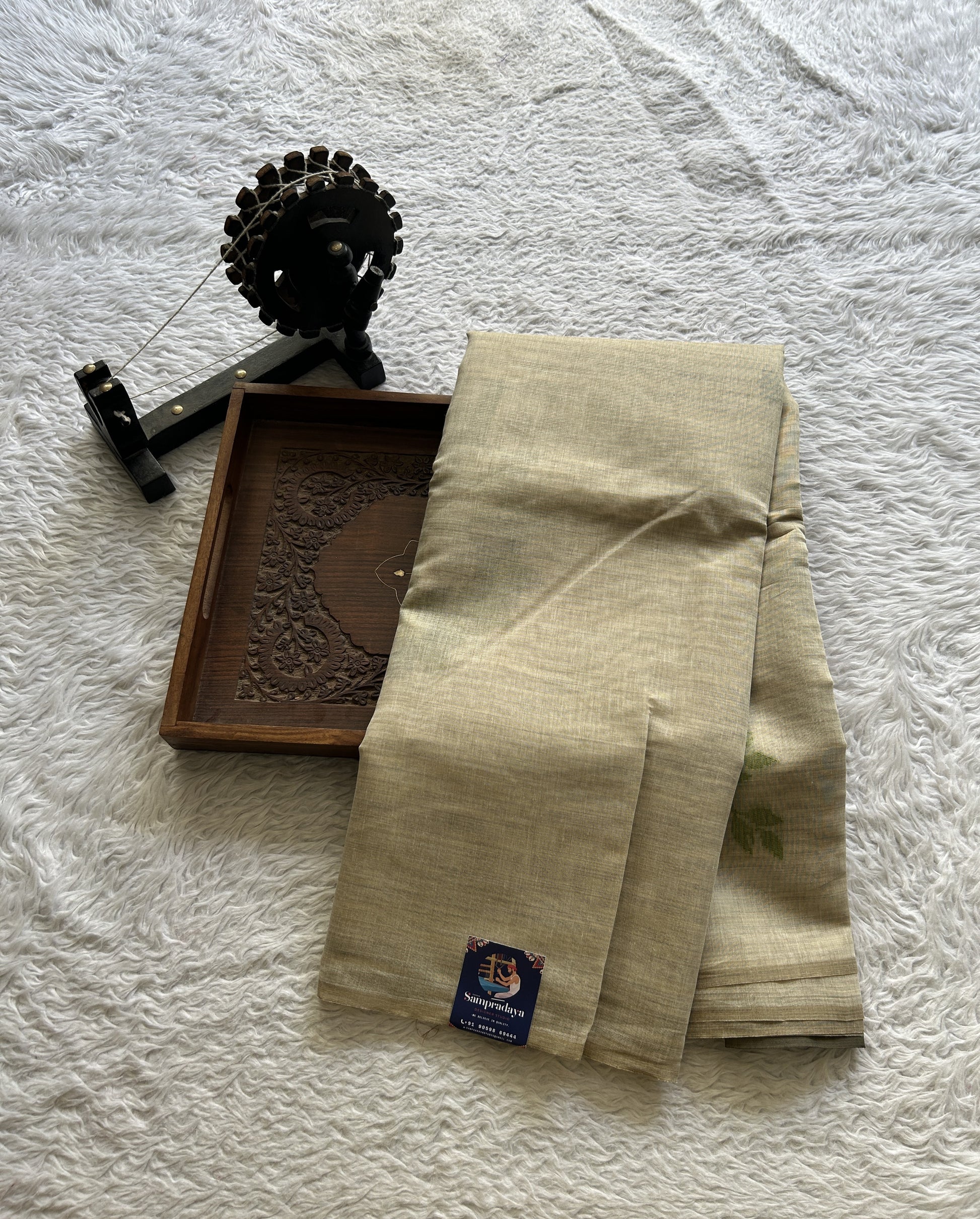 Semi Tussar Saree Colored Bright Cream Complemented with a Borderless. - Sampradaya Designer Studio