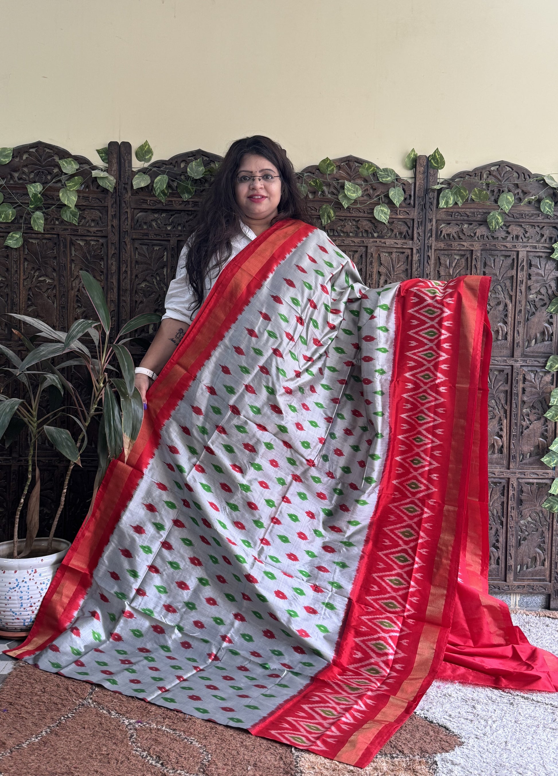 Ikkat Pattu Saree Light Gray colored complemented with a Zari border. - Sampradaya Designer Studio