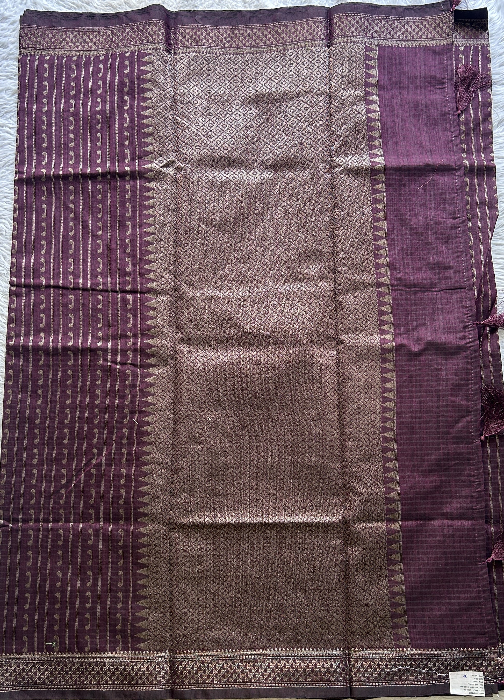 Semi Tussar Saree Colored Burgundy Complemented with a Zari Border. - Sampradaya Designer Studio