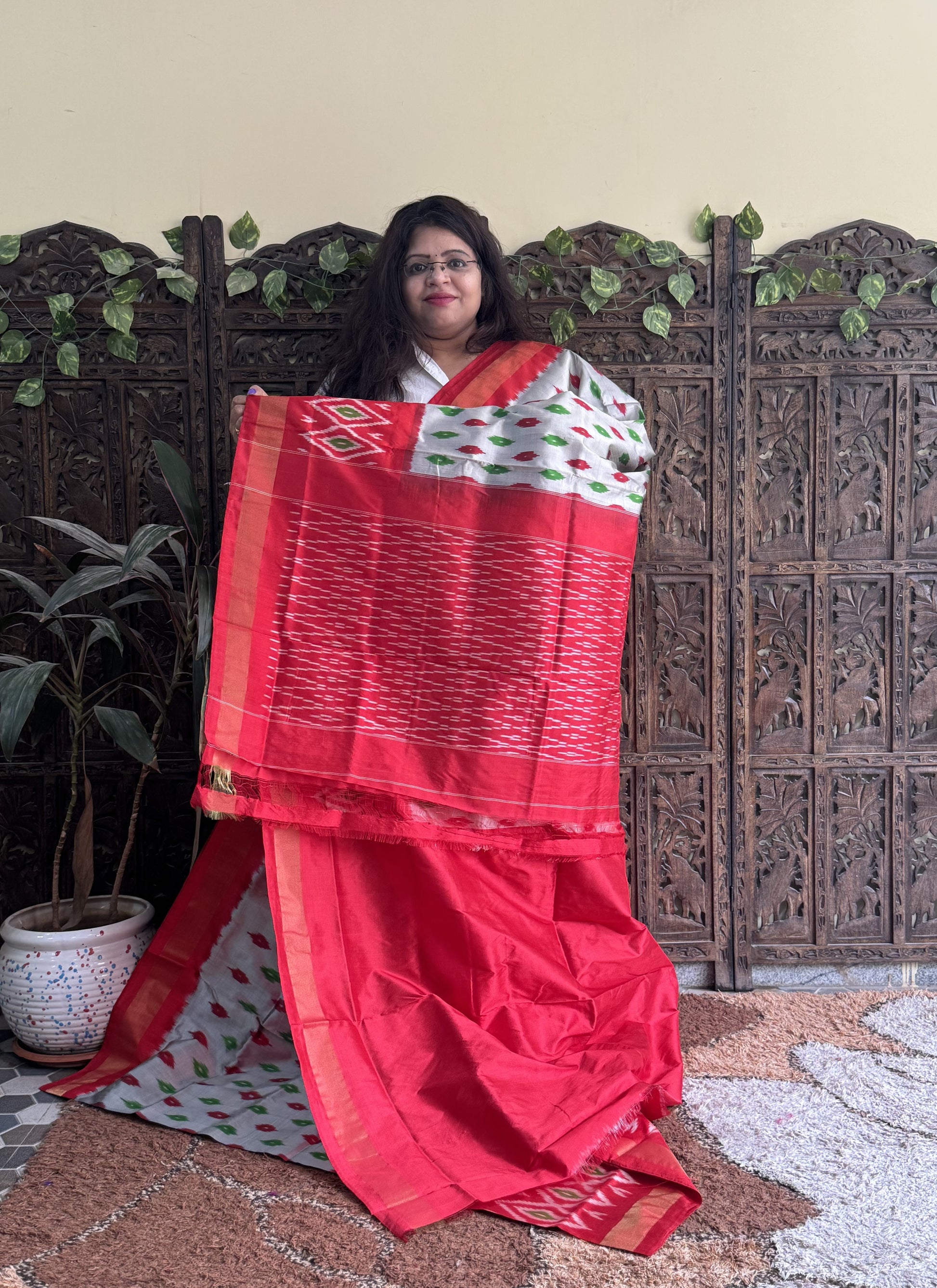 Ikkat Pattu Saree Light Gray colored complemented with a Zari border. - Sampradaya Designer Studio