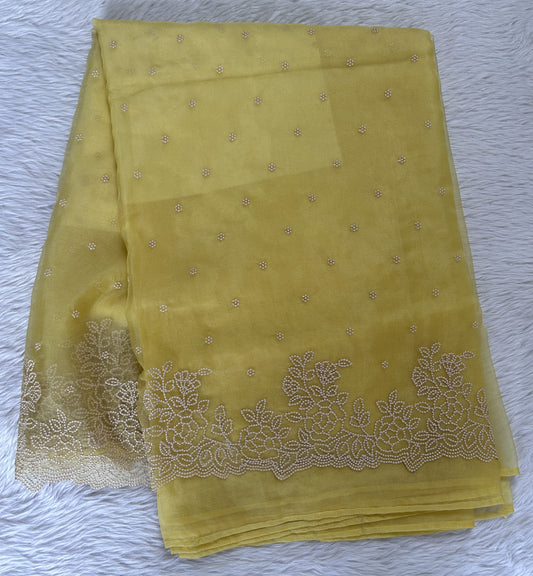 Soft Organza Designer Saree Yellow colored Saree complemented with a Machine Embroidery border. - Sampradaya Designer Studio