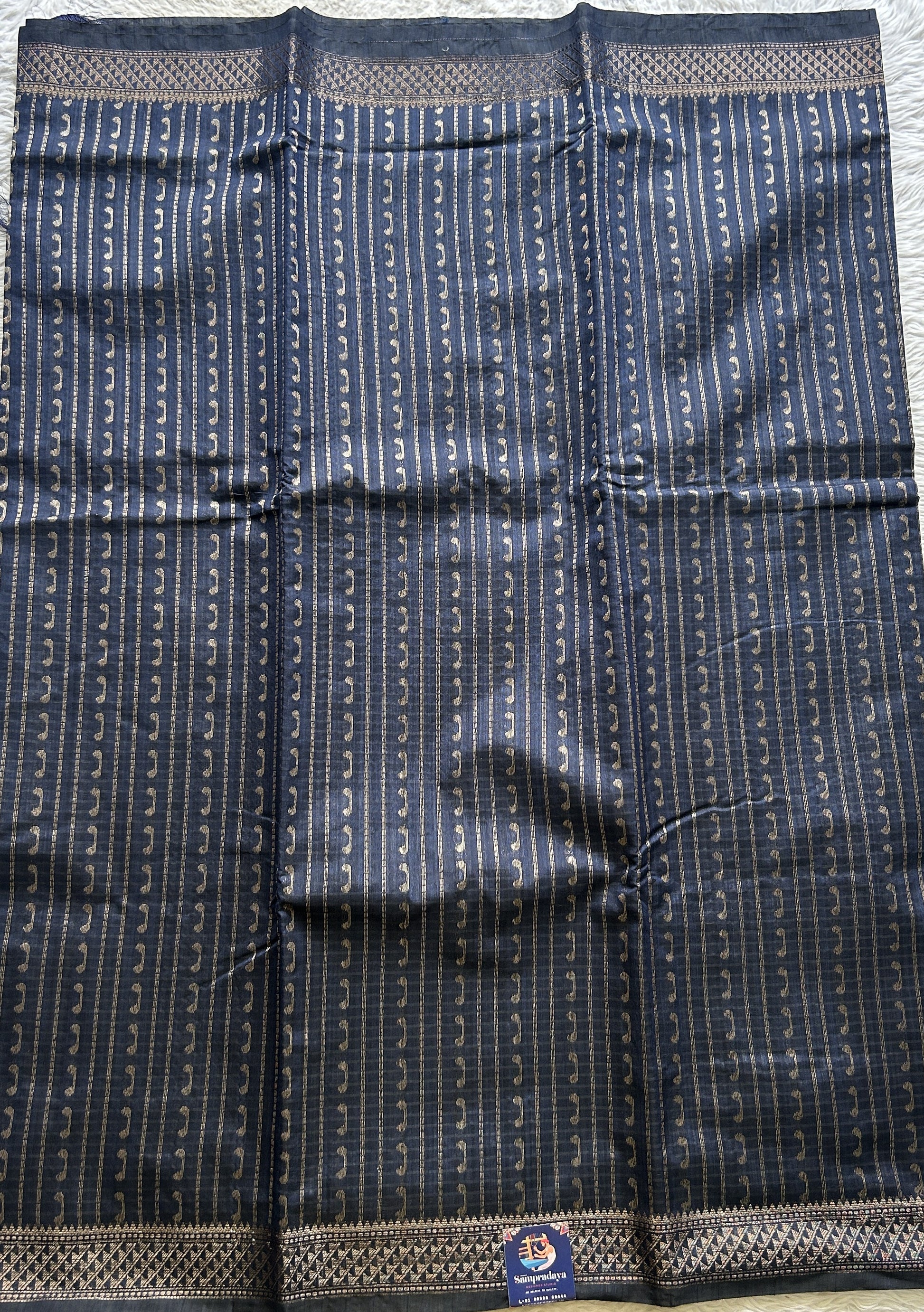 Semi Tussar Saree Colored Dark Navy blue Complemented with a Zari Border. - Sampradaya Designer Studio