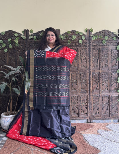Ikkat Pattu Saree Red colored complemented with a Ikkat Zari border. - Sampradaya Designer Studio