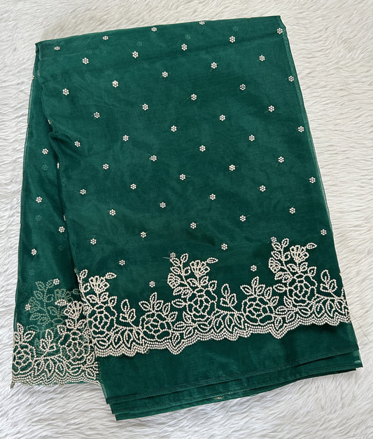 Soft Organza Designer Saree Bottle Green colored Saree complemented with a Machine Embroidery border. - Sampradaya Designer Studio