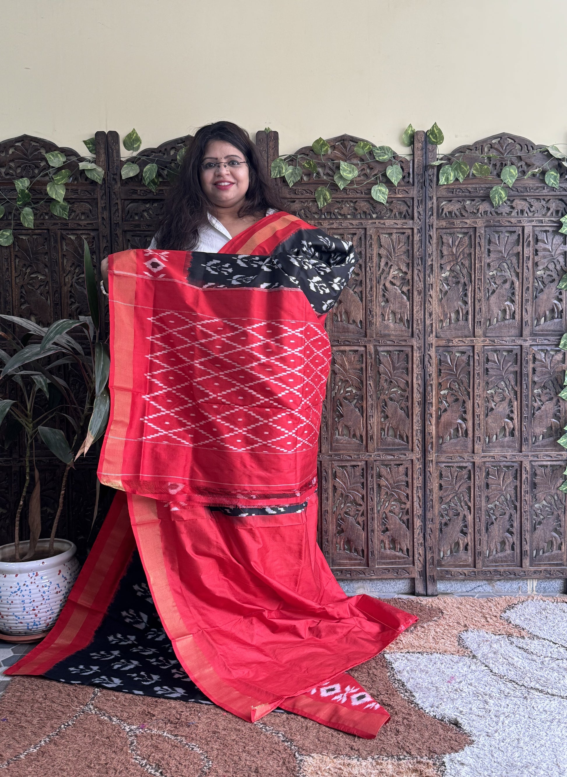 Ikkat Pattu Saree Black colored complemented with a Ikkat Zari border. - Sampradaya Designer Studio