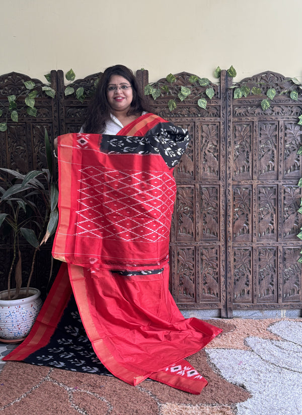 Ikkat Pattu Saree Black colored complemented with a Ikkat Zari border. - Sampradaya Designer Studio