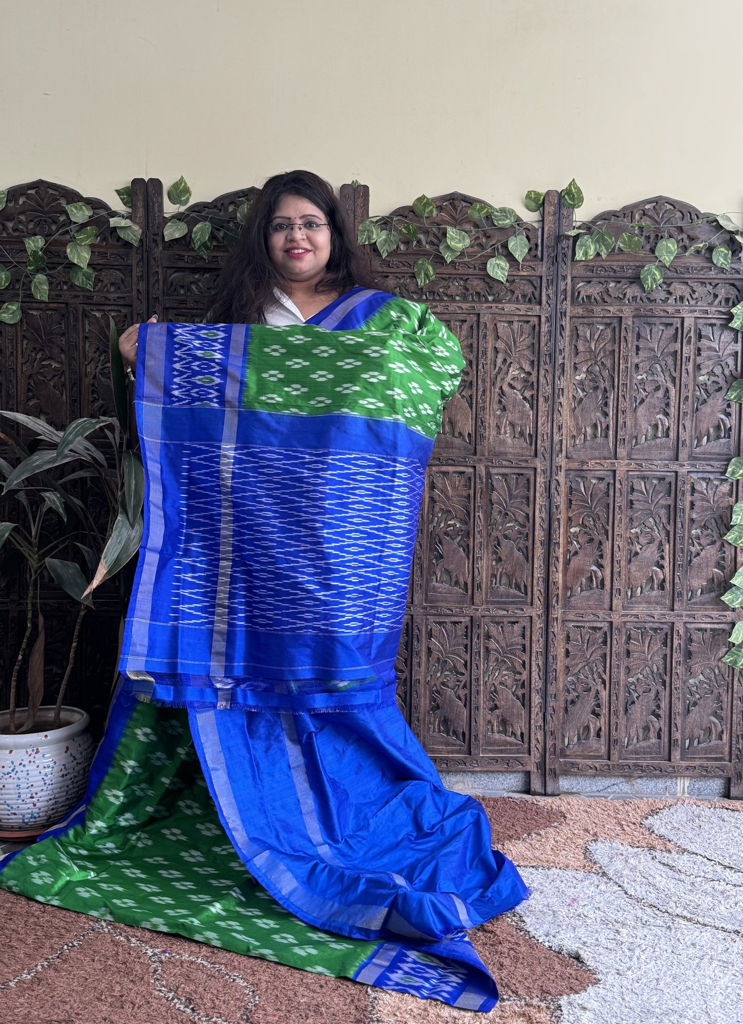Ikkat Pattu Saree Green colored complemented with a Ikkat Zari border. - Sampradaya Designer Studio