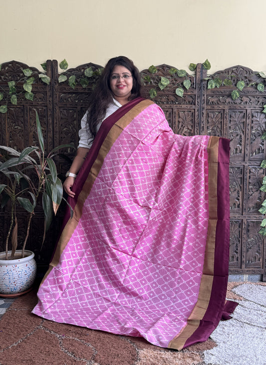 Ikkat Pattu Saree Light Pink colored complemented with a Zari border. - Sampradaya Designer Studio