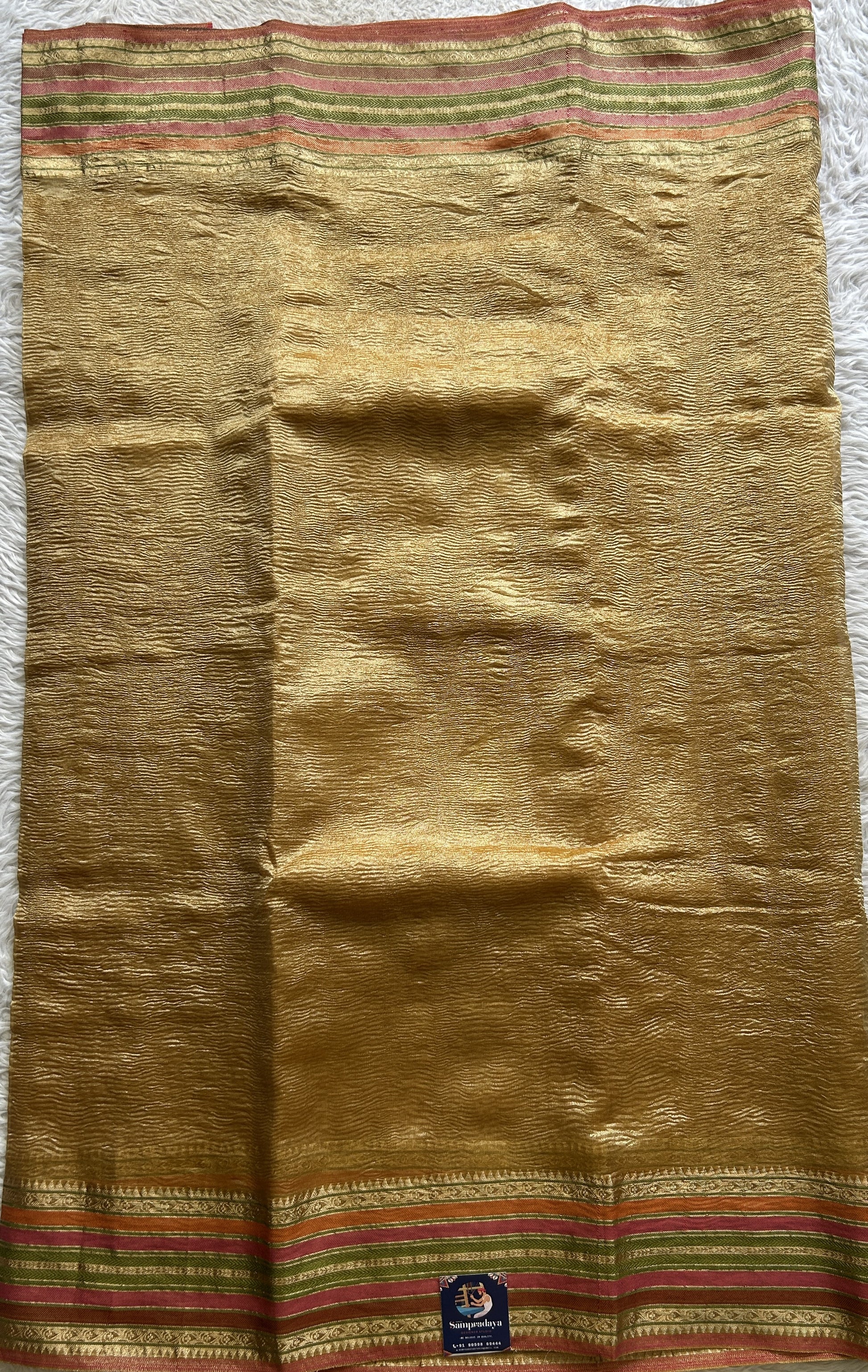 Banarasi Fancy Crushed Saree Gold Colored Complemented with a Zari Border. - Sampradaya Designer Studio