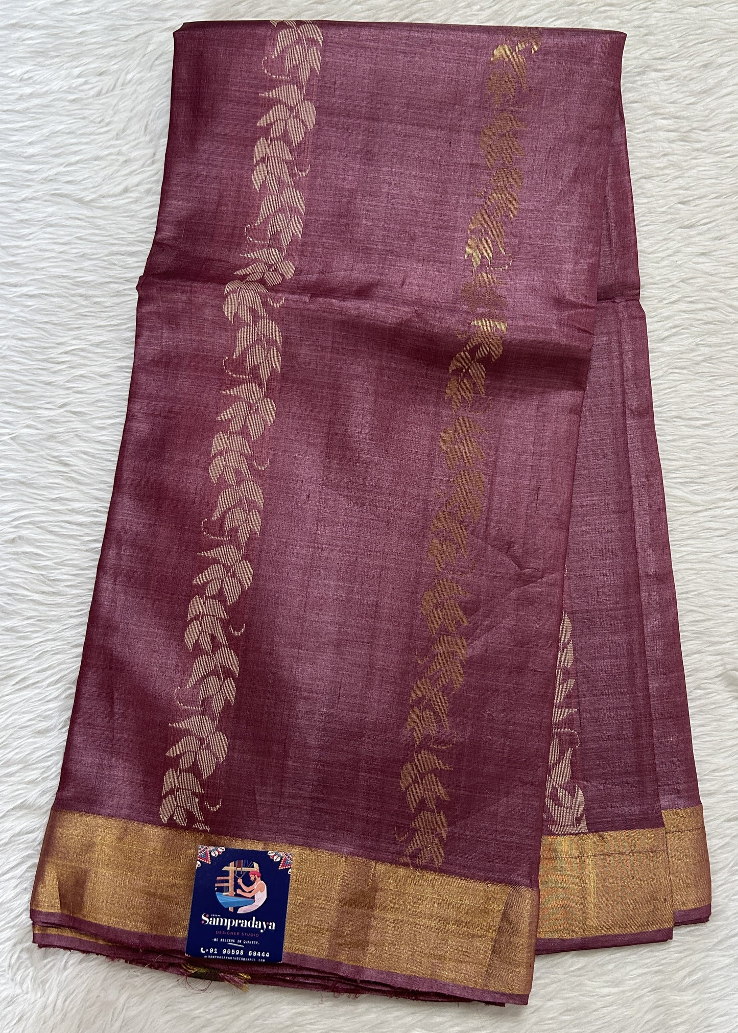 Tussar Silk Saree Magenta colored Saree complemented with a Gold Zari border. - Sampradaya Designer Studio