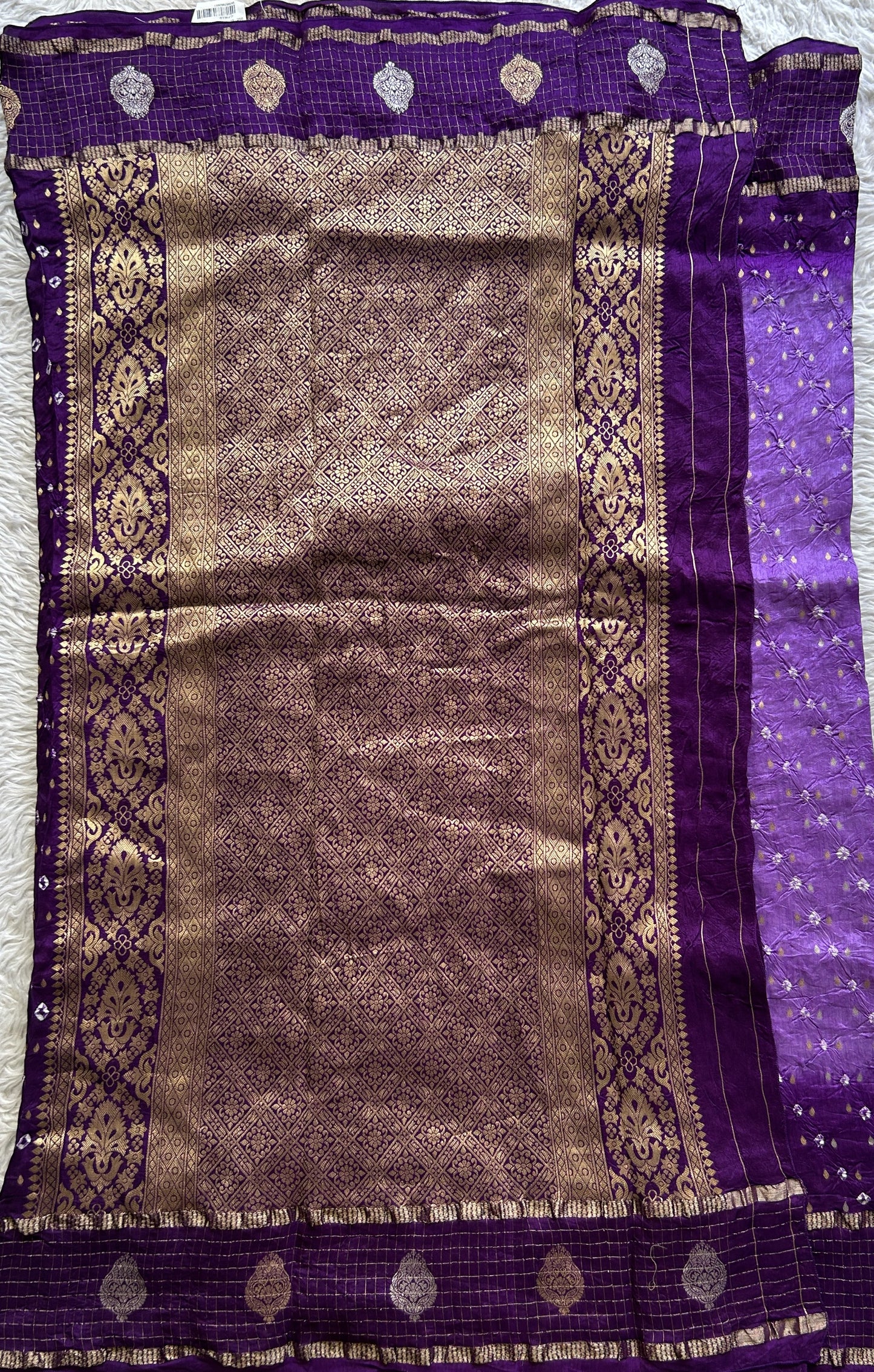 Semi Georgette Bandhani Saree Purple Colored Paired with a Zari Border. - Sampradaya Designer Studio