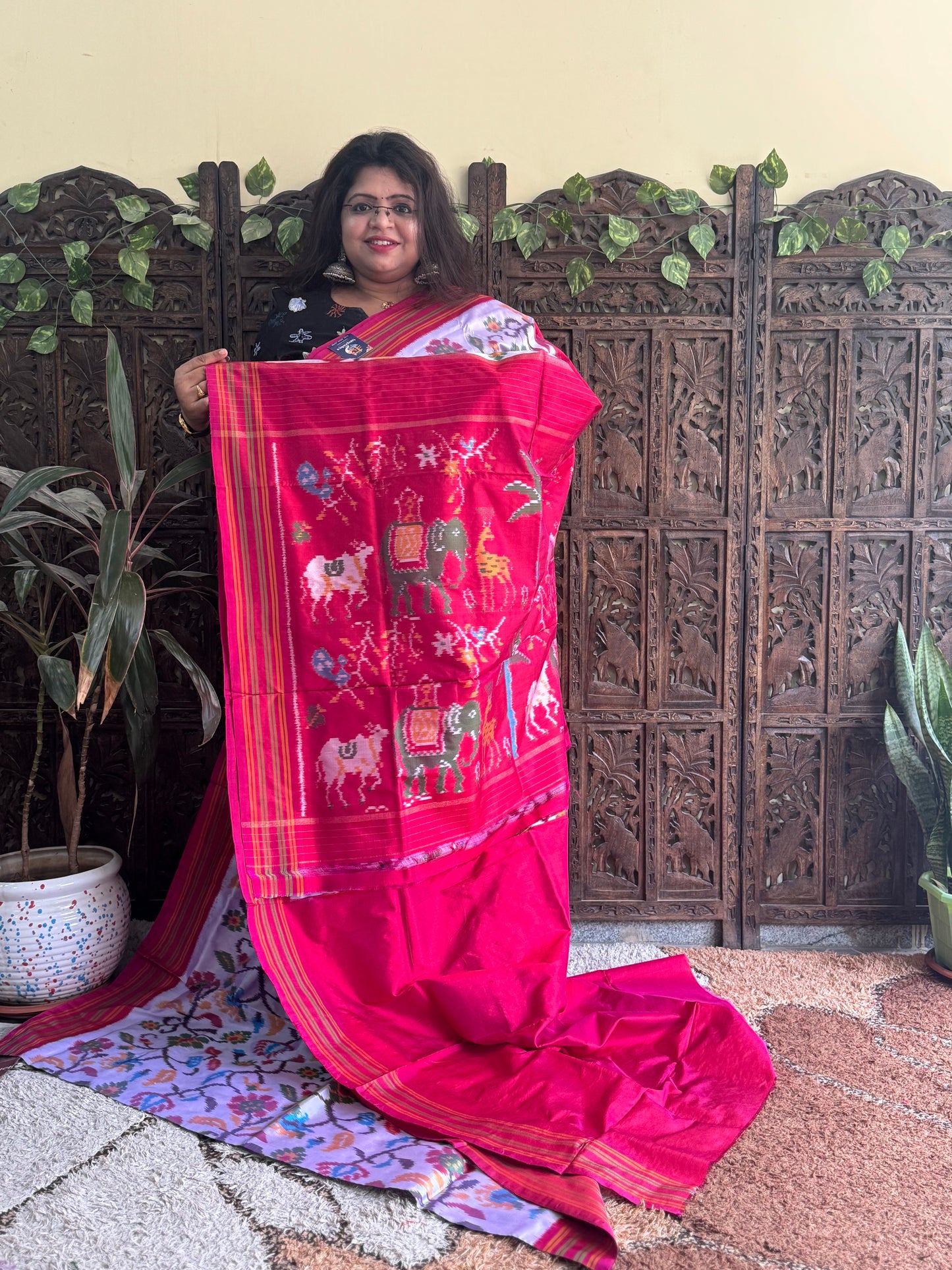 Ikkat Pattu Saree Light Lilac colored complemented with a Patola border. - Sampradaya Designer Studio