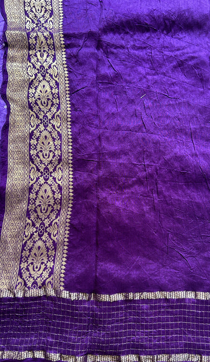 Semi Georgette Bandhani Saree Purple Colored Paired with a Zari Border. - Sampradaya Designer Studio