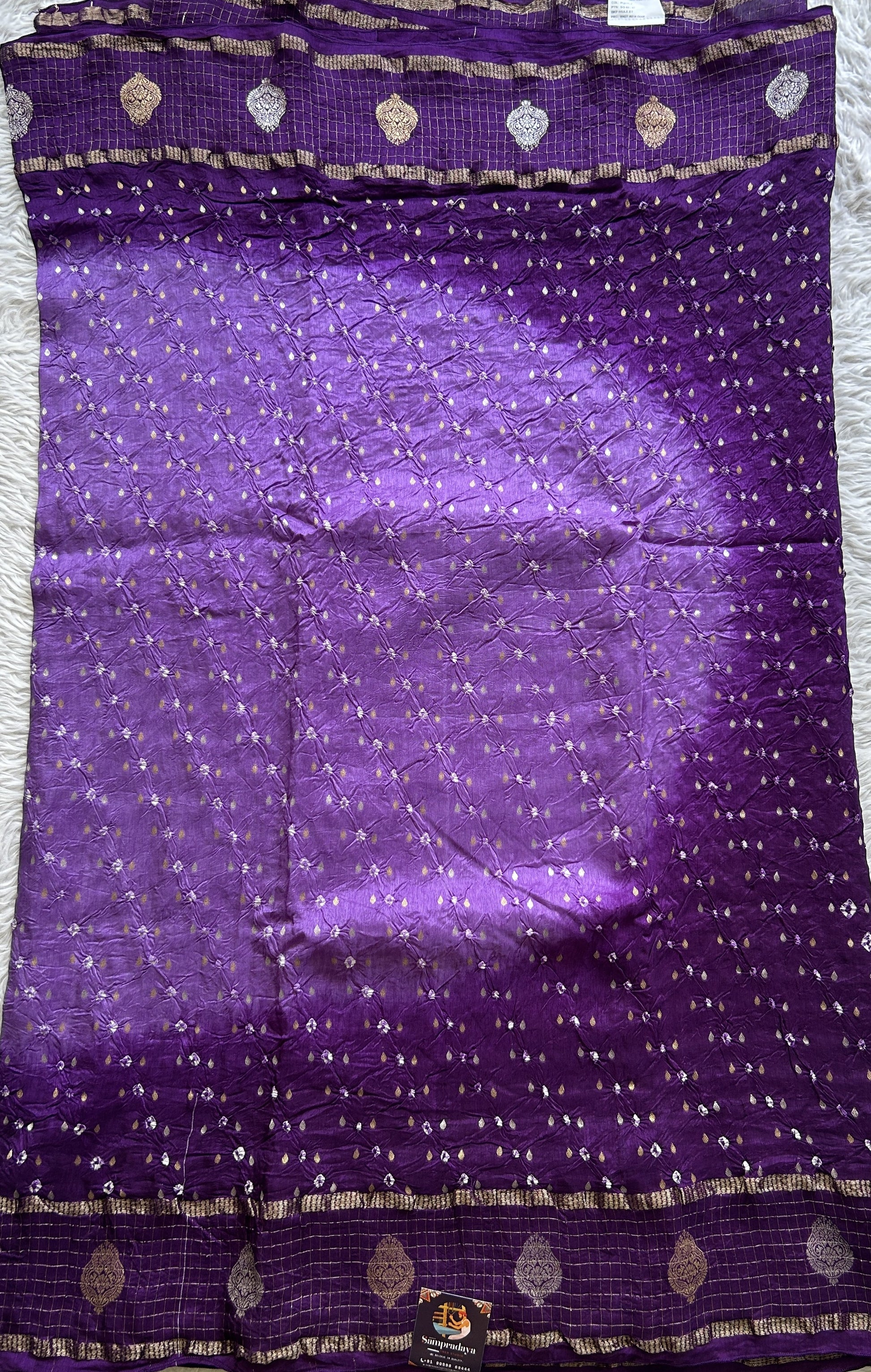 Semi Georgette Bandhani Saree Purple Colored Paired with a Zari Border. - Sampradaya Designer Studio