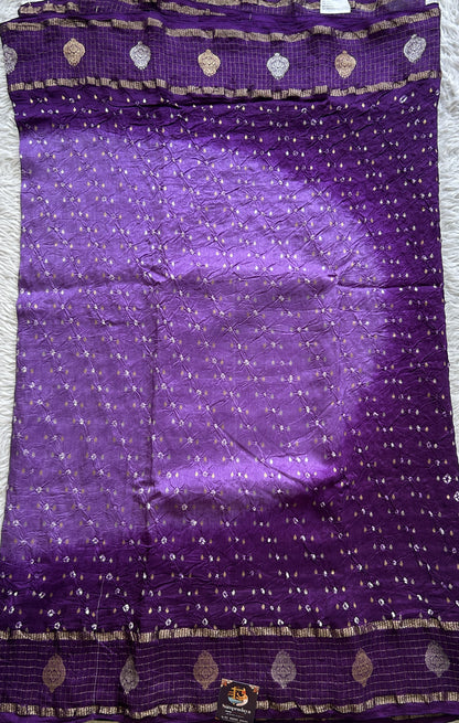 Semi Georgette Bandhani Saree Purple Colored Paired with a Zari Border. - Sampradaya Designer Studio