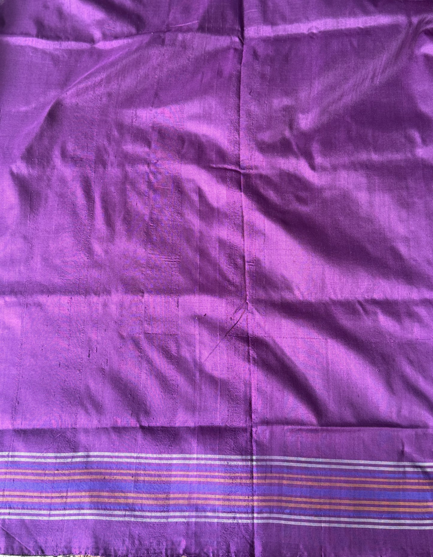 Ikkat Pattu Saree Sea Green colored complemented with a Patola border. - Sampradaya Designer Studio