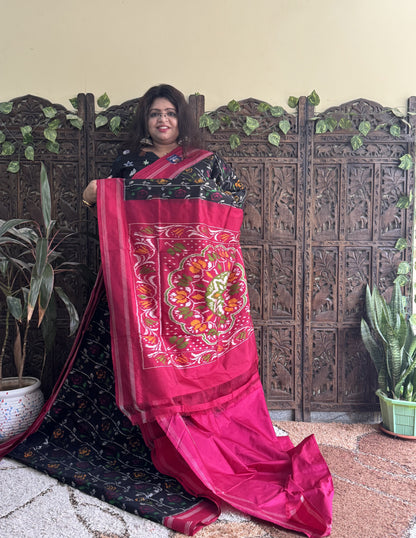 Ikkat Pattu Saree Black colored complemented with a Patola border. - Sampradaya Designer Studio