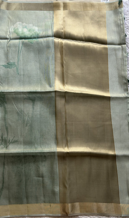 Semi Tussar Tissue Saree Light Green Colored complemented with a Zari Border. - Sampradaya Designer Studio