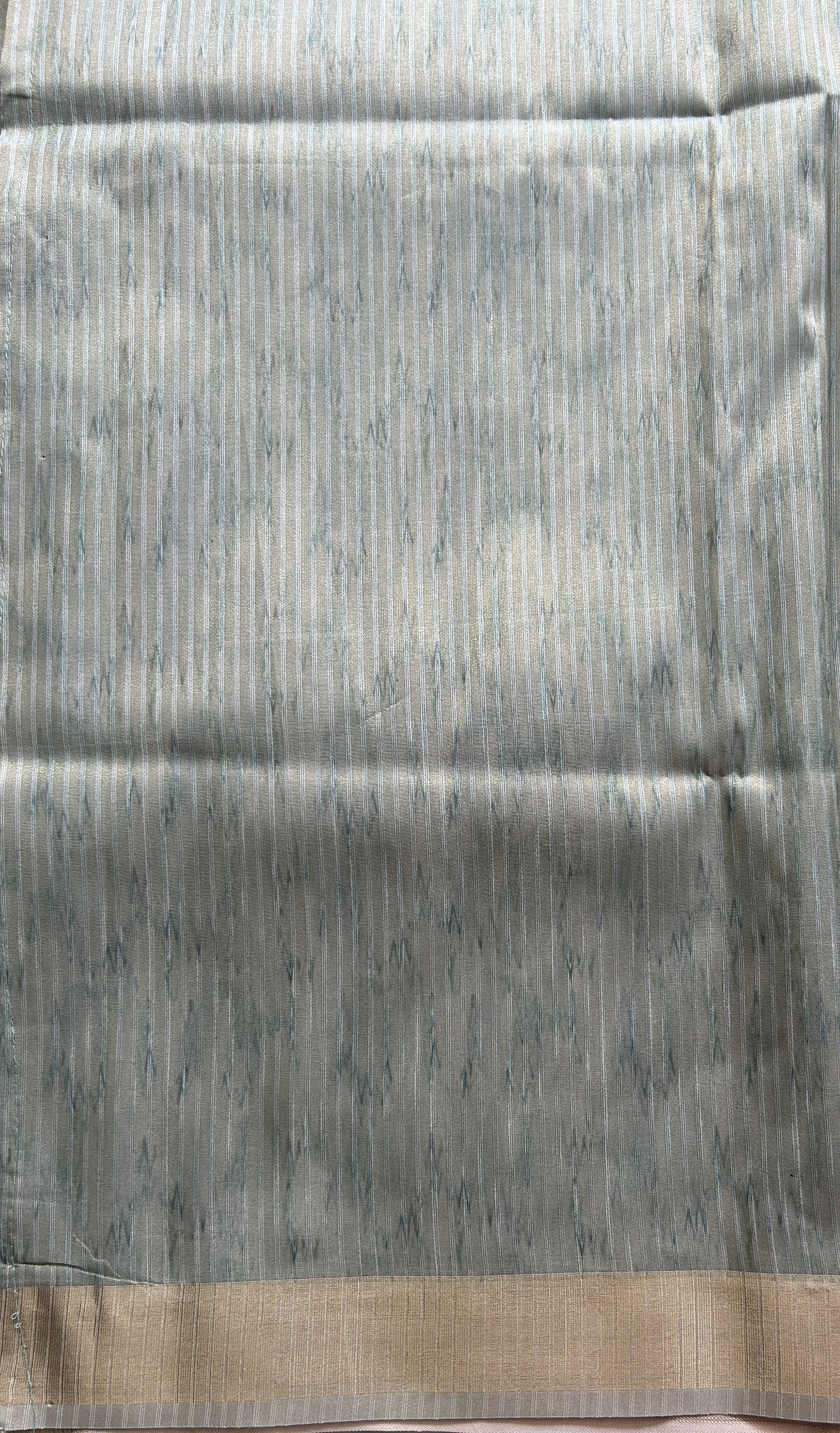 Semi Tussar Tissue Saree Light Green Colored complemented with a Zari Border. - Sampradaya Designer Studio