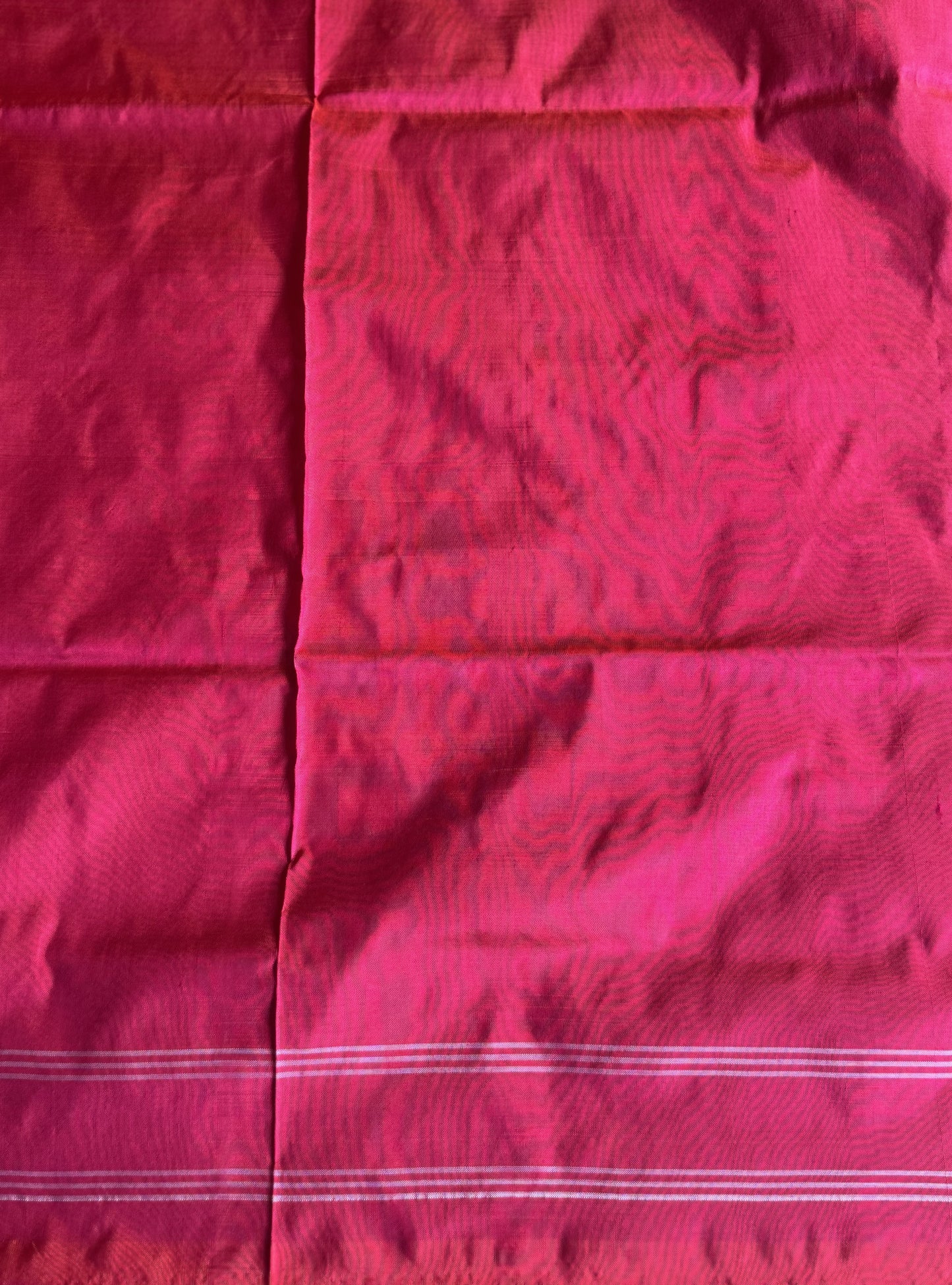 Ikkat Pattu Saree Wine colored complemented with a Patola border. - Sampradaya Designer Studio
