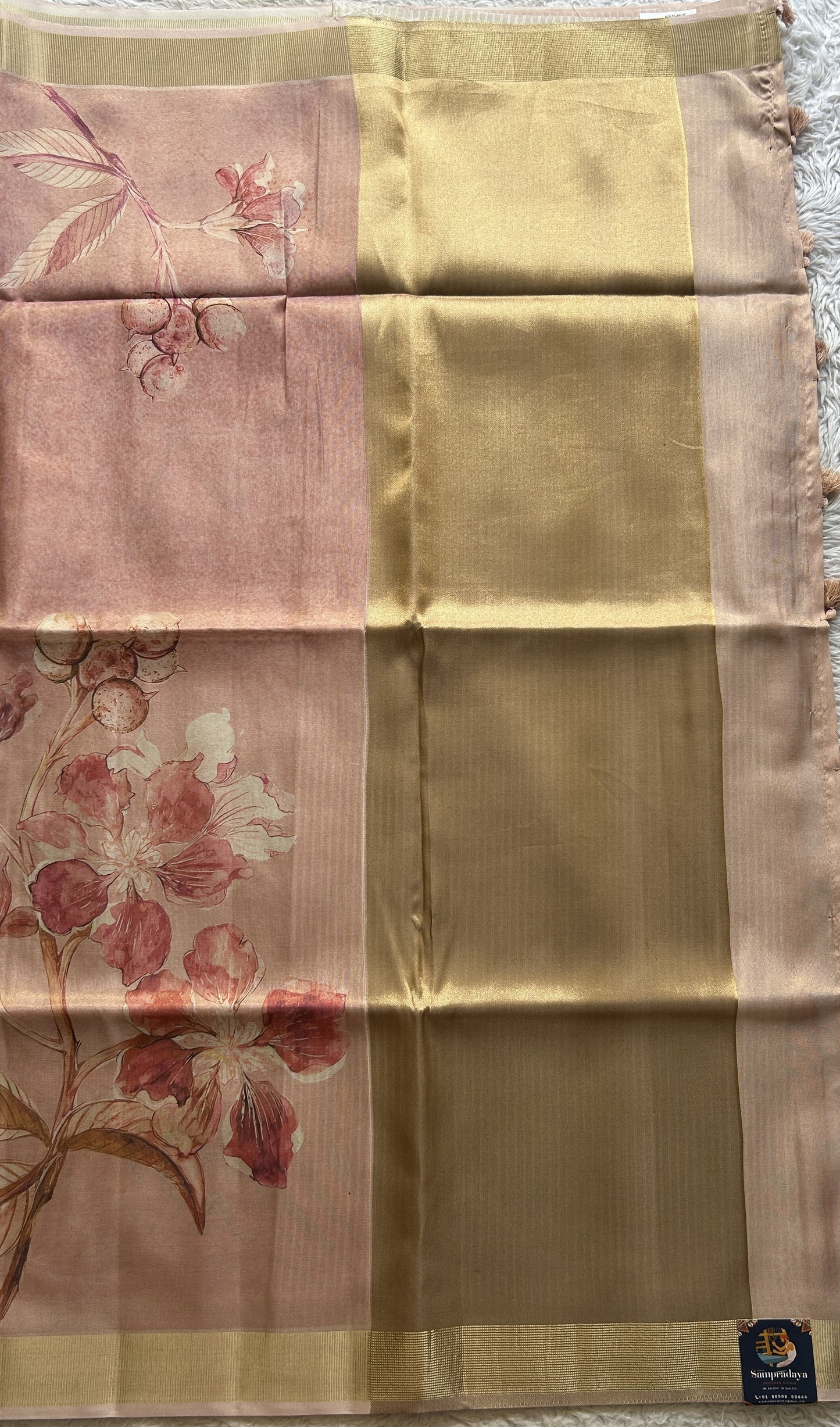 Semi Tussar Tissue Saree Peach Colored complemented with a Zari Border. - Sampradaya Designer Studio