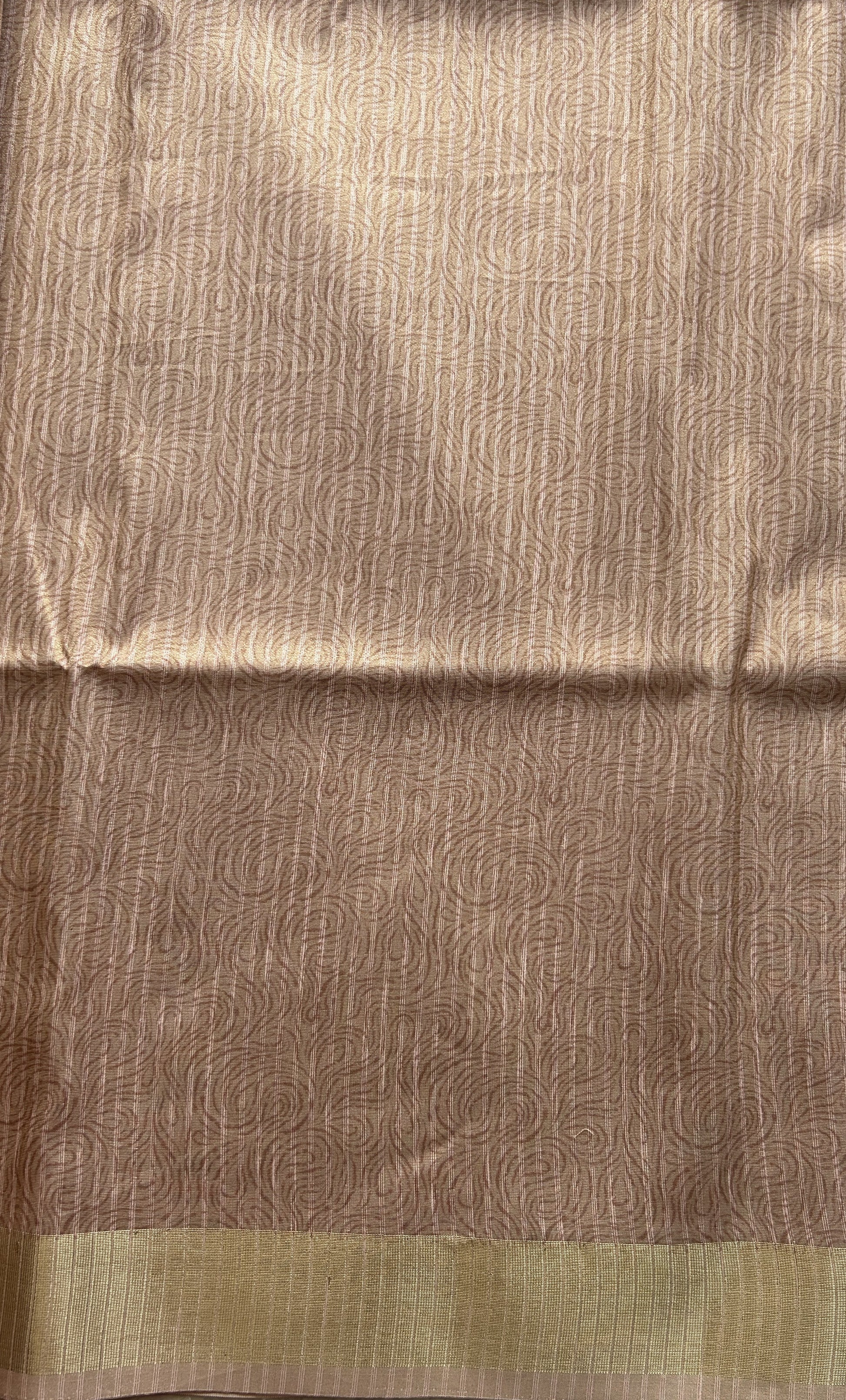 Semi Tussar Tissue Saree Peach Colored complemented with a Zari Border. - Sampradaya Designer Studio