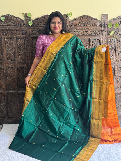 Narayanpet Silk Saree Dark Bottle Green Colored Complemented with a Gold Zari Border. - Sampradaya Designer Studio