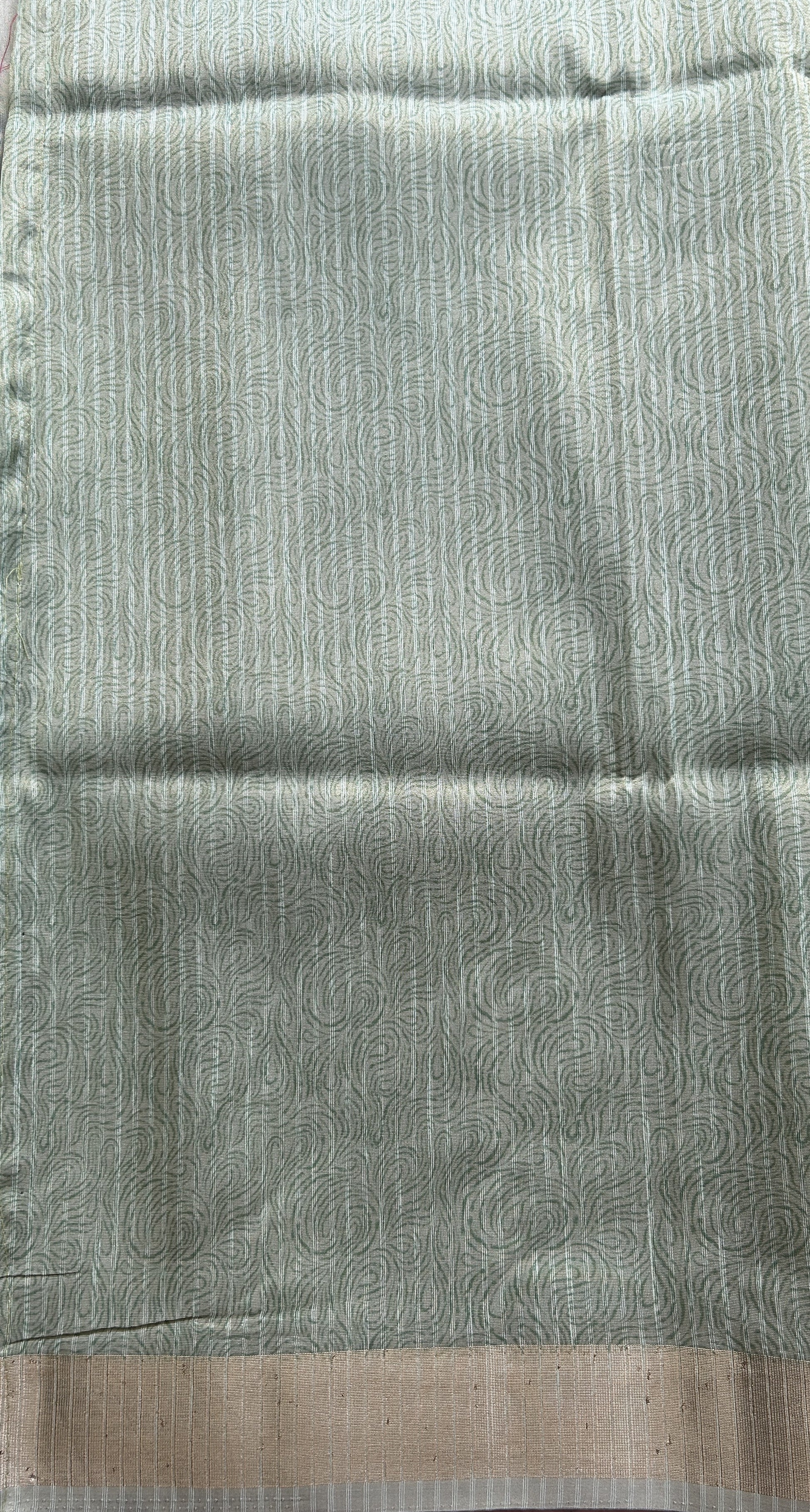 Semi Tussar Tissue Saree Pastel Green Colored complemented with a Zari Border. - Sampradaya Designer Studio