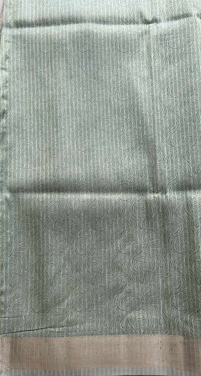 Semi Tussar Tissue Saree Pastel Green Colored complemented with a Zari Border. - Sampradaya Designer Studio