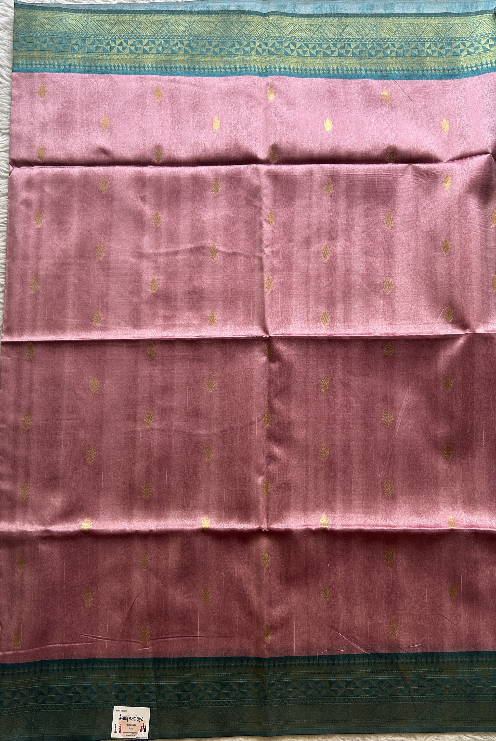 Semi Tussar Saree Baby Pink Colored complemented with a Zari Border. - Sampradaya Designer Studio
