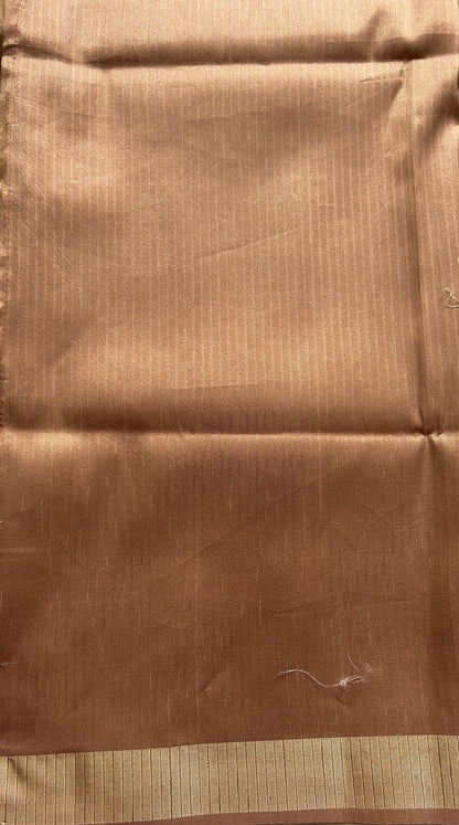 Semi Tussar Saree Dark Sandal Colored complemented with a Zari Border. - Sampradaya Designer Studio