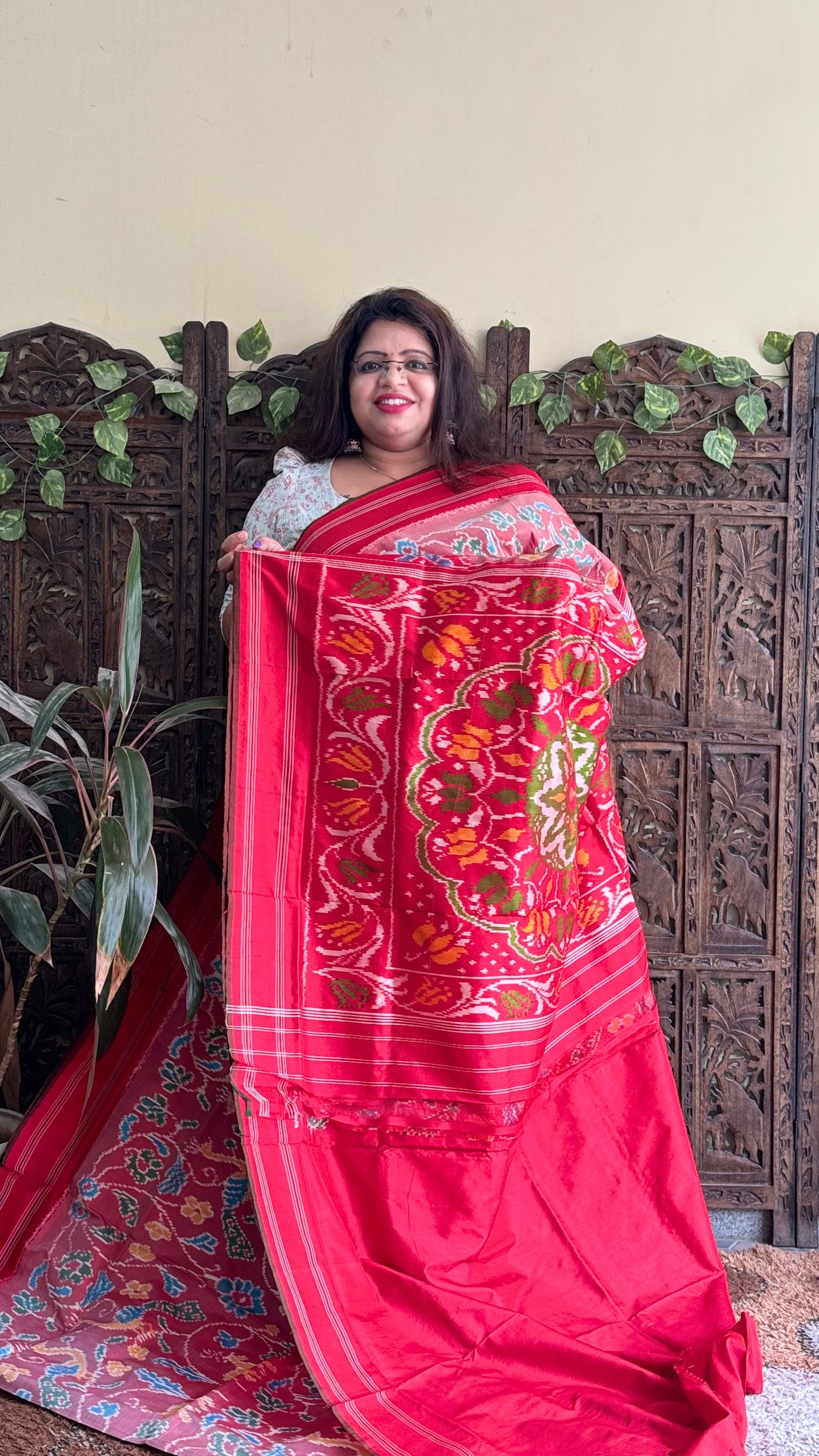 Ikkat Pattu Saree Onion Pink colored complemented with a Patola border. - Sampradaya Designer Studio