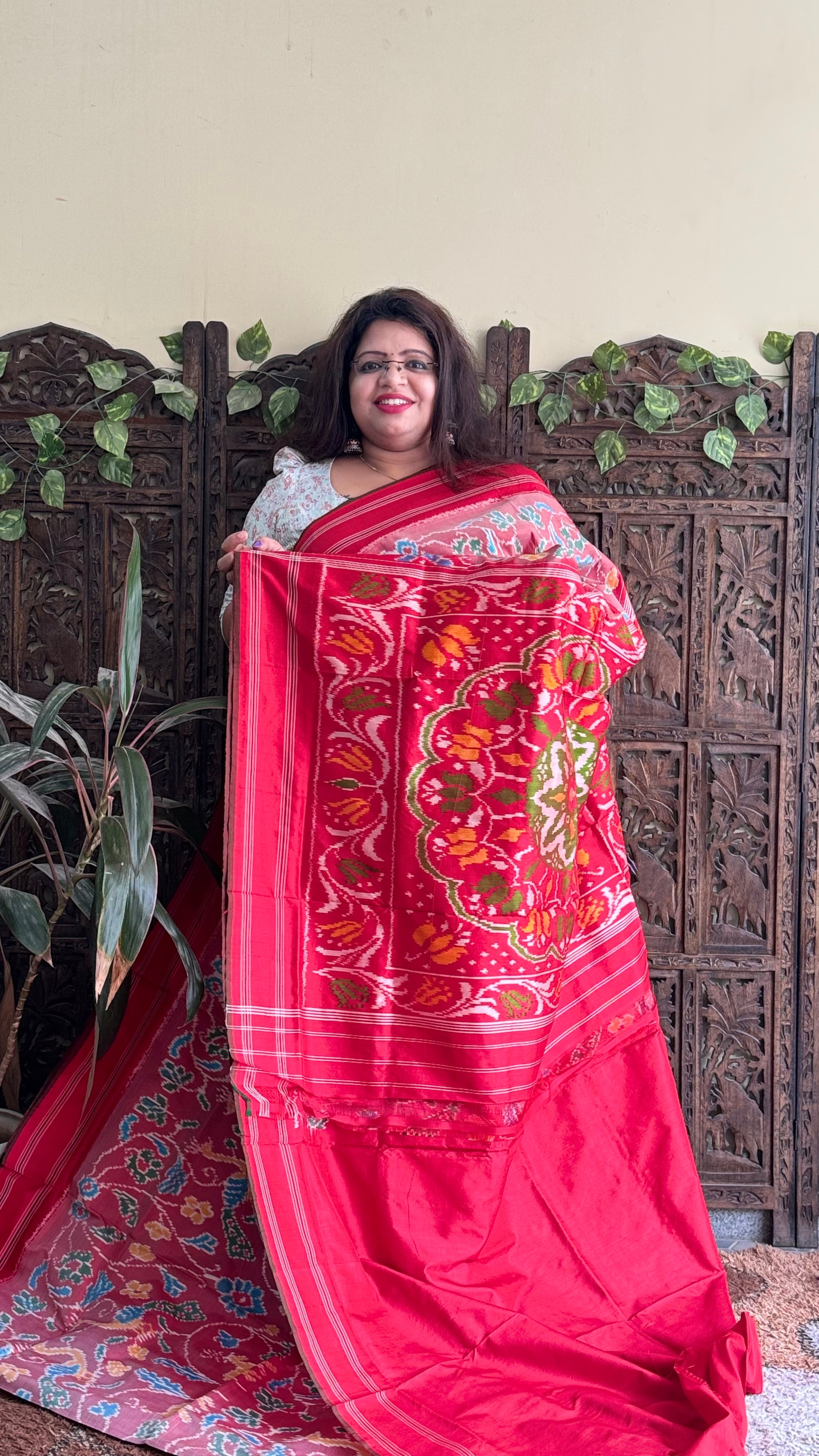 Ikkat Pattu Saree Onion Pink colored complemented with a Patola border. - Sampradaya Designer Studio