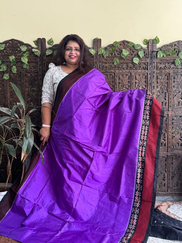 Ikkat Pattu Saree Purple colored complemented with a Checks border. - Sampradaya Designer Studio