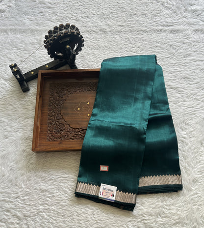 Mangalagiri Plain Pattu Saree Bottle Green colored complemented with a Zari Border - Sampradaya Designer Studio
