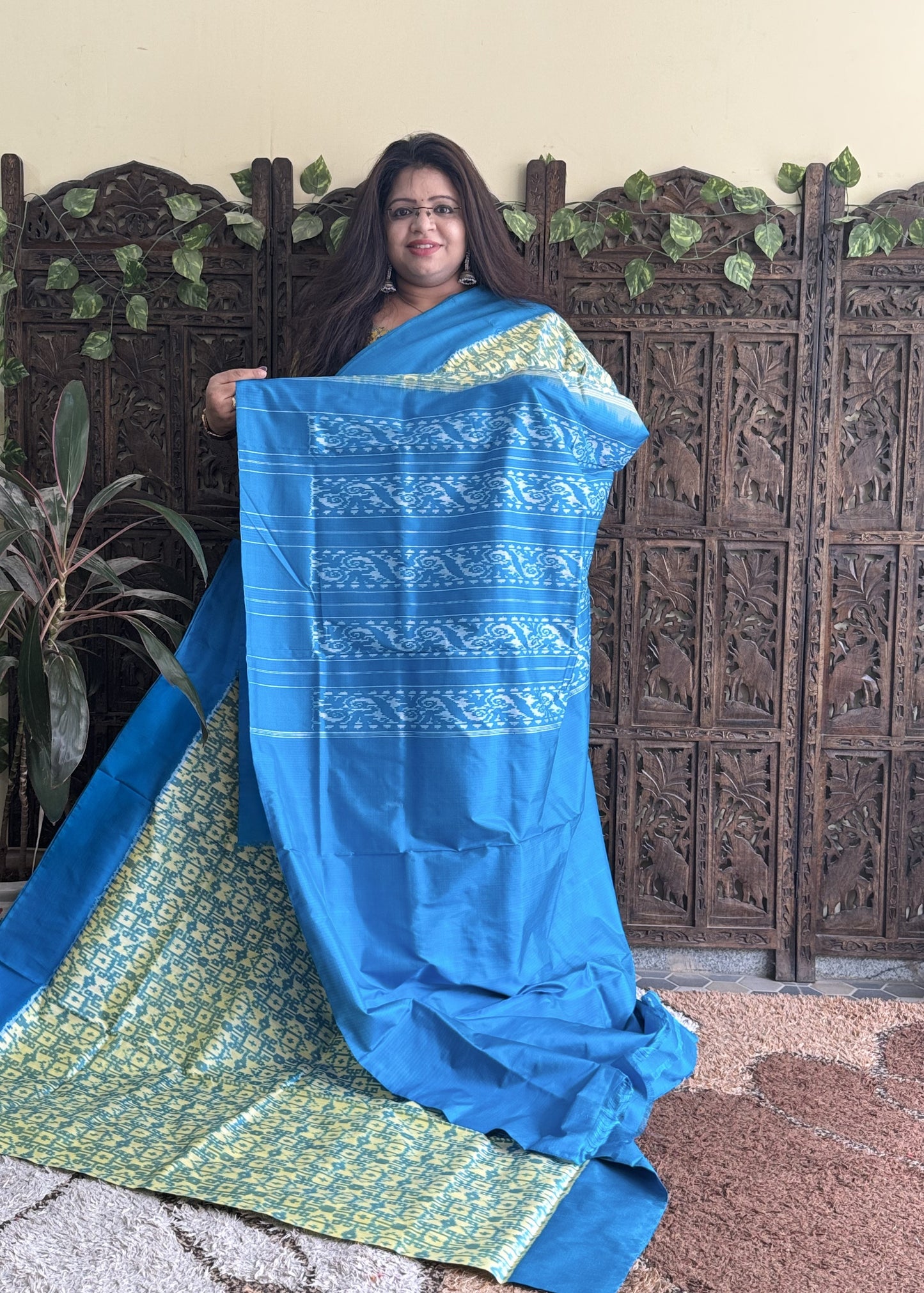 Ikkat Pattu Saree Biscuit colored complemented with a Plain border. - Sampradaya Designer Studio