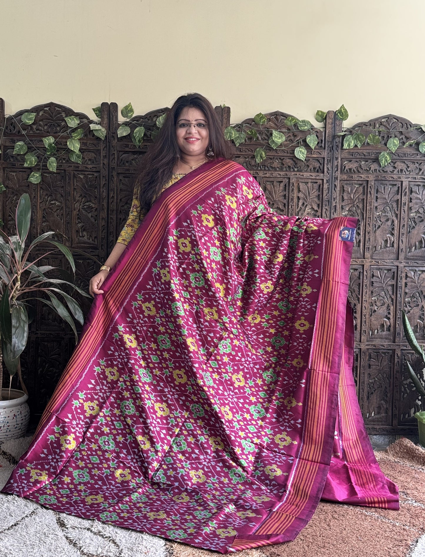 Ikkat Pattu Saree Rose Pink colored complemented with a Patola border. - Sampradaya Designer Studio