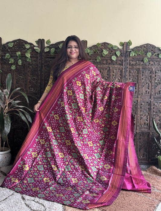 Ikkat Pattu Saree Rose Pink colored complemented with a Patola border. - Sampradaya Designer Studio