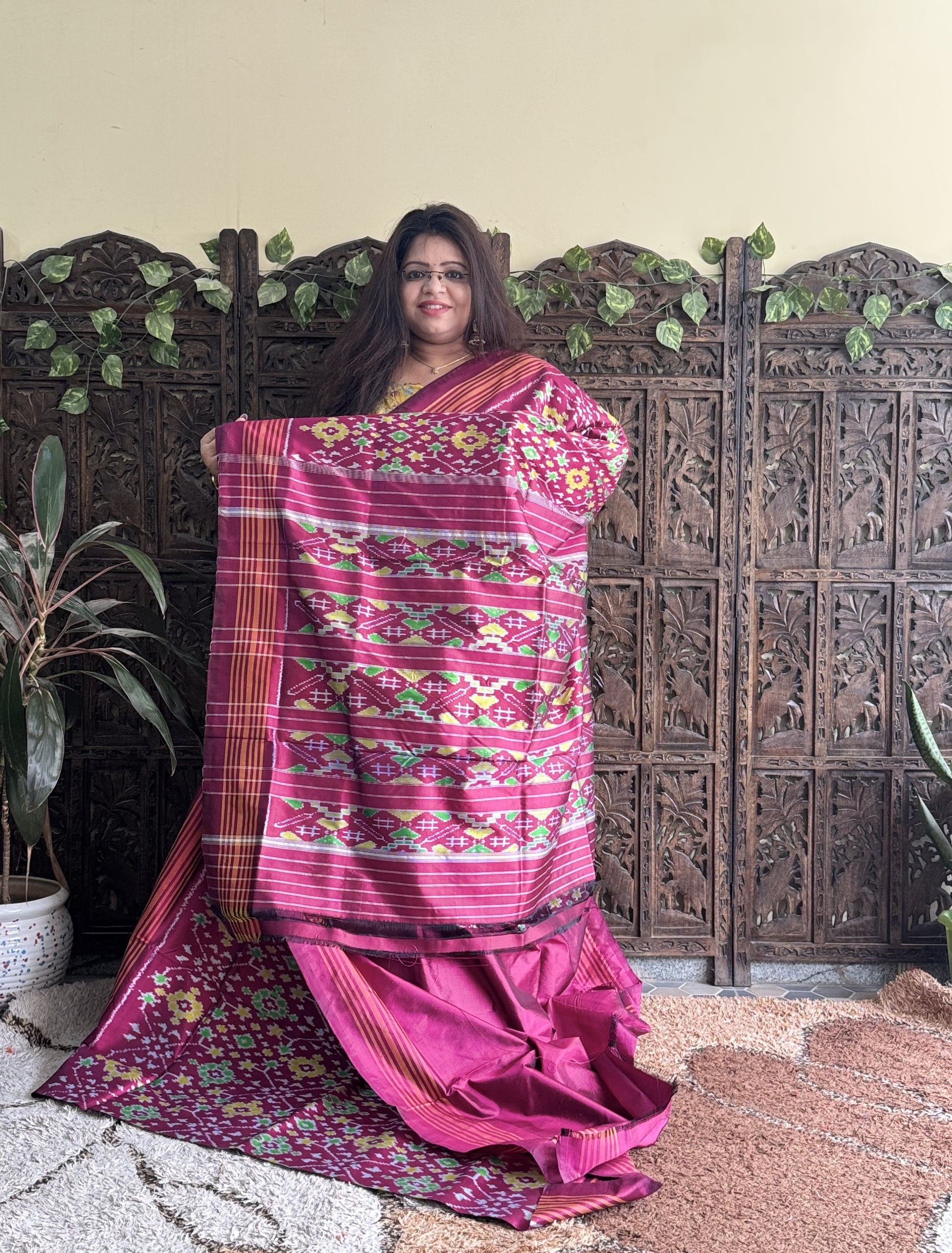 Ikkat Pattu Saree Rose Pink colored complemented with a Patola border. - Sampradaya Designer Studio