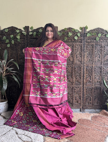 Ikkat Pattu Saree Rose Pink colored complemented with a Patola border. - Sampradaya Designer Studio
