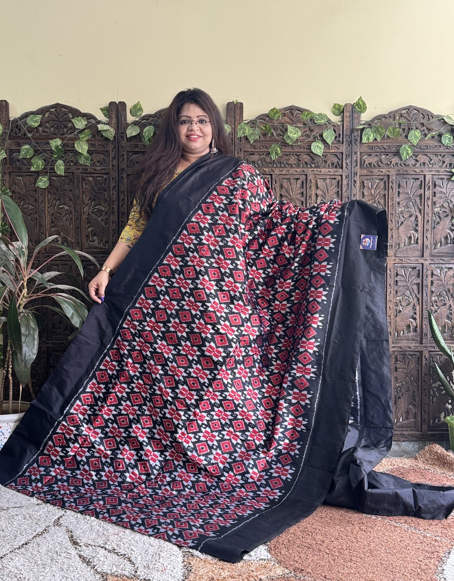 Ikkat Pattu Saree Black colored complemented with a Plain border. - Sampradaya Designer Studio