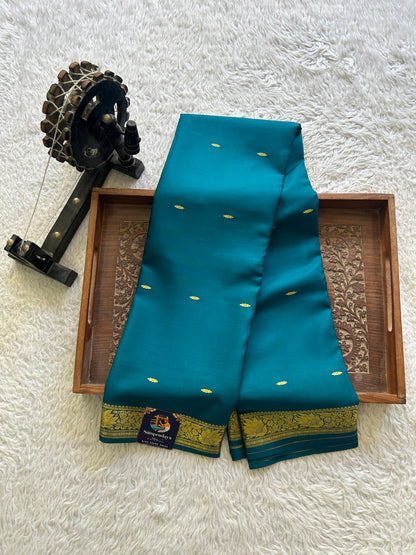 Peacock Blue Mysore Crepe Silk Saree with Silver Zari Border | Pure Handloom | Silk Mark Certified - Sampradaya Designer Studio